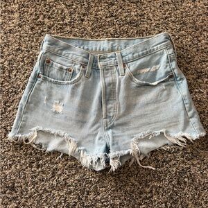 Levi’s 501 Light Blue Distressed Denim Shorts